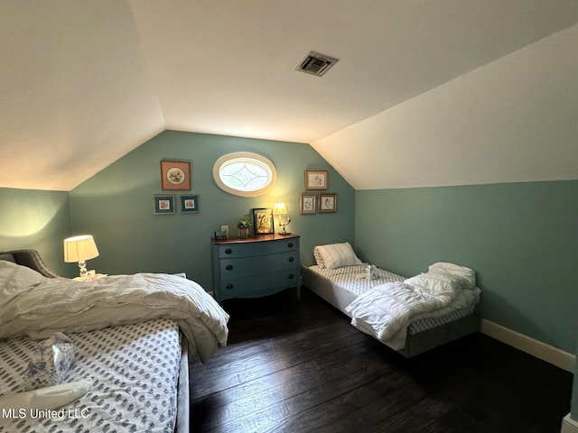 59 Dunbar Rd, Natchez, MS 39120 - bedroom with hardwood / wood-style floors and lofted ceiling