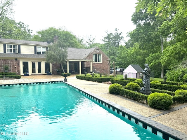 59 Dunbar Rd, Natchez, MS 39120 - outdoor pool featuring french doors and fence