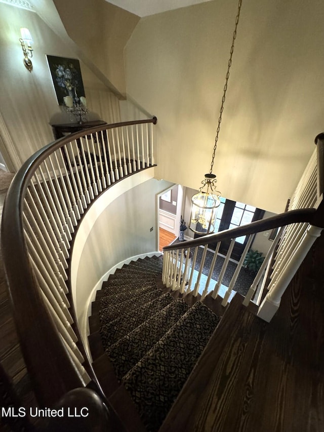 59 Dunbar Rd, Natchez, MS 39120 - stairway with a chandelier