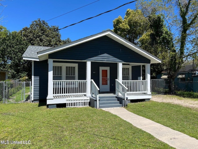 bungalow-style house with a porch, fence, a front yard, and a shingled roof