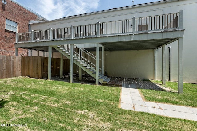 433 Main St, Natchez, MS 39120 - back of property featuring stairs, a deck, and concrete block siding