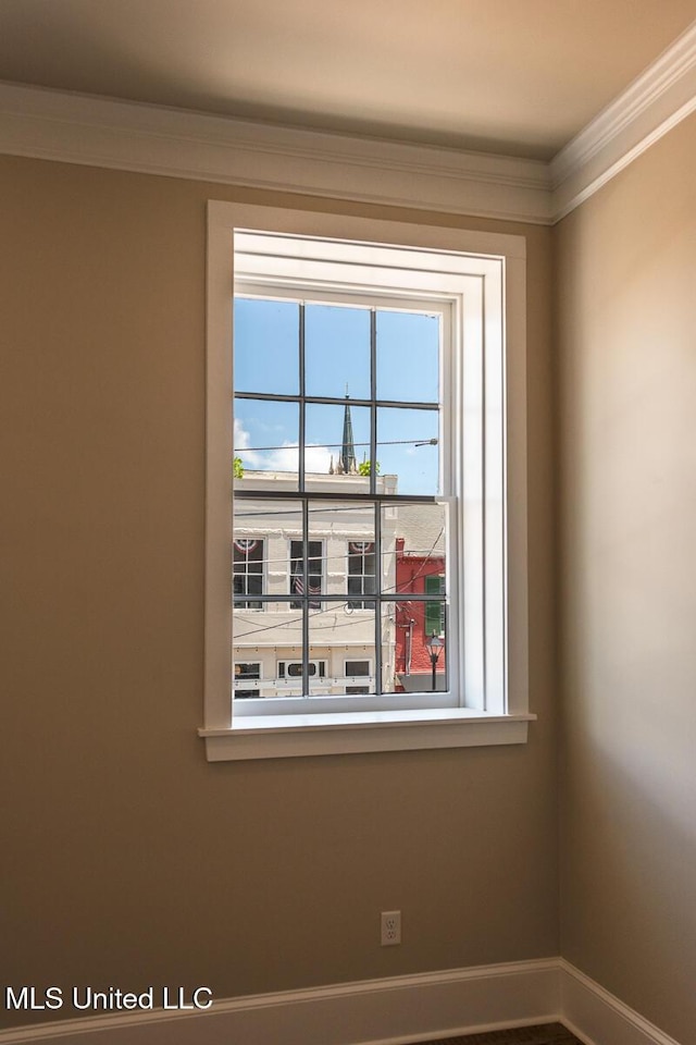 433 Main St, Natchez, MS 39120 - unfurnished room with crown molding and baseboards