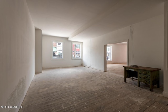 433 Main St, Natchez, MS 39120 - empty room featuring healthy amount of natural light and wood finished floors