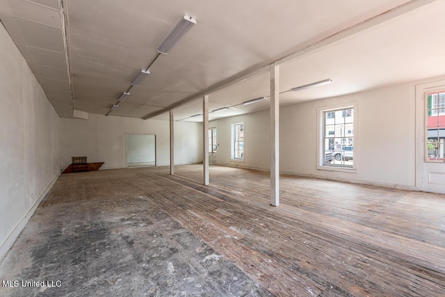 433 Main St, Natchez, MS 39120 - basement featuring healthy amount of natural light and wood finished floors