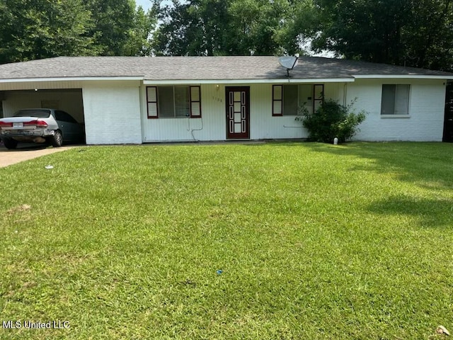 1108 Wooddell Dr, Jackson, MS 39212 - ranch-style house with an attached carport, a front yard, covered porch, brick siding, and driveway