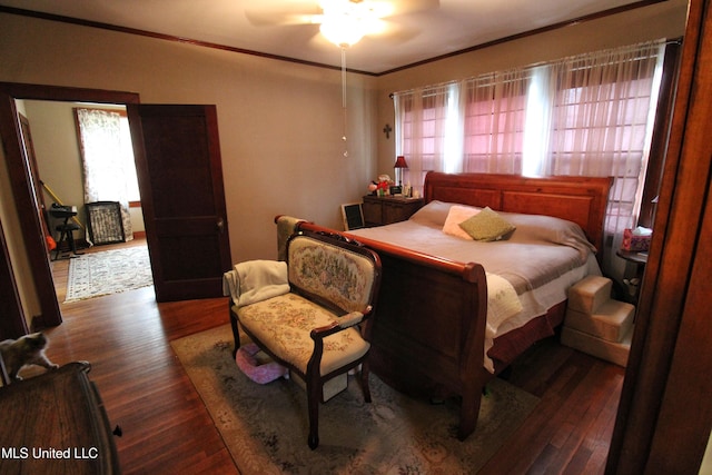865 Fairfield Ave, Grenada, MS 38901 - bedroom featuring ceiling fan, dark hardwood / wood-style flooring, and ornamental molding