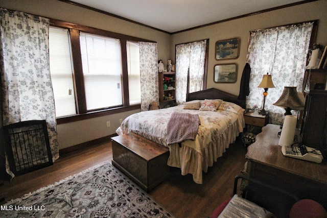 865 Fairfield Ave, Grenada, MS 38901 - bedroom with wood-type flooring and crown molding