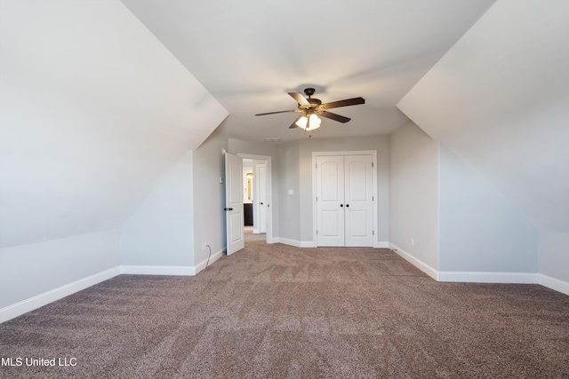 bonus room with carpet, ceiling fan, lofted ceiling, and baseboards