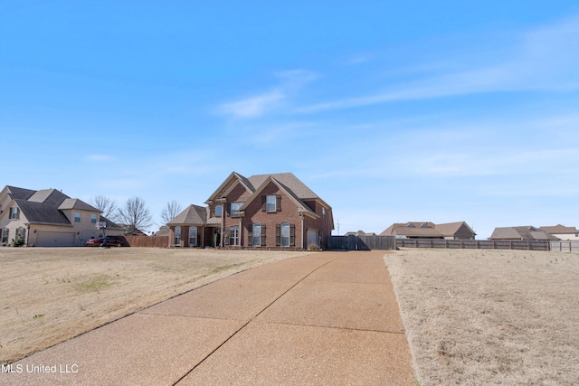 view of front of property featuring fence