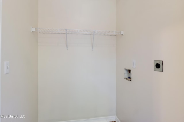 laundry room with hookup for an electric dryer and hookup for a washing machine