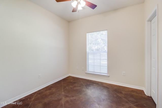 spare room featuring ceiling fan