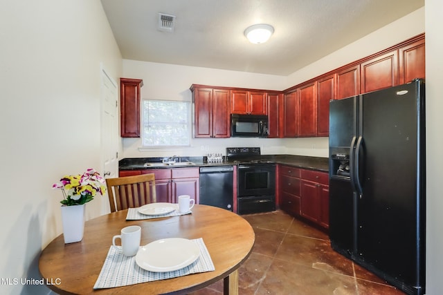 kitchen with sink and black appliances