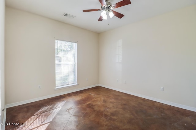 tiled empty room with ceiling fan