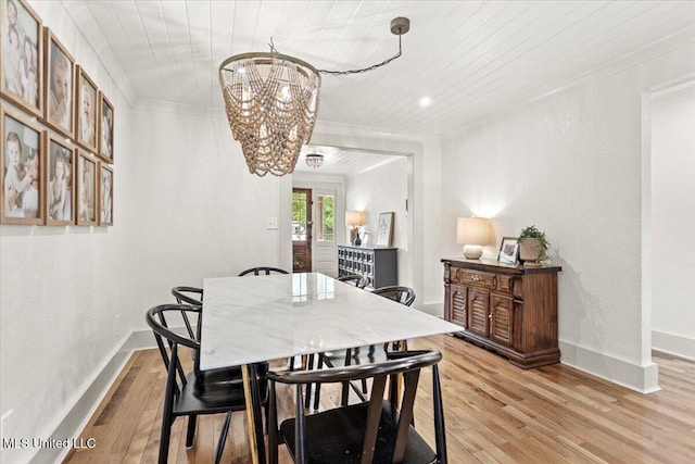 7101 Wayne Ln, Biloxi, MS 39532 - dining room with a chandelier, wood ceiling, light wood-style floors, crown molding, and recessed lighting