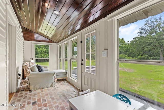 7101 Wayne Ln, Biloxi, MS 39532 - sunroom with wood ceiling, lofted ceiling, brick flooring, and french doors