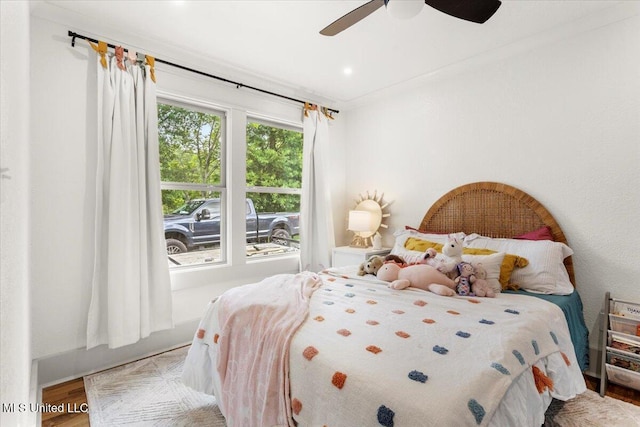 7101 Wayne Ln, Biloxi, MS 39532 - bedroom featuring wood finished floors and a ceiling fan