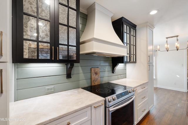 kitchen featuring stainless steel electric range, white cabinetry, dark wood-type flooring, and custom exhaust hood