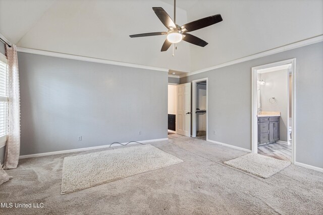 190 Briarwood Dr, Holly Springs, MS 38635 - unfurnished bedroom with vaulted ceiling, carpet floors, crown molding, baseboards, and connected bathroom