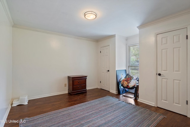 190 Briarwood Dr, Holly Springs, MS 38635 - empty room with dark wood-style flooring, ornamental molding, and baseboards