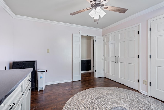 190 Briarwood Dr, Holly Springs, MS 38635 - unfurnished bedroom featuring ornamental molding, dark wood-style floors, baseboards, a ceiling fan, and a closet