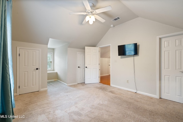 190 Briarwood Dr, Holly Springs, MS 38635 - unfurnished bedroom with light carpet, vaulted ceiling, and baseboards