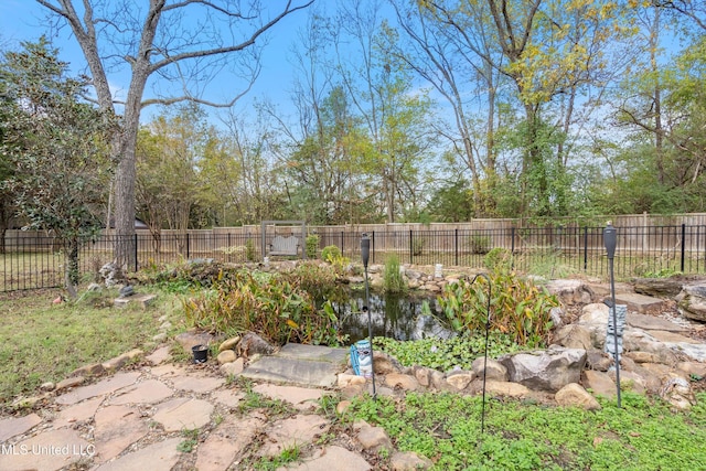 190 Briarwood Dr, Holly Springs, MS 38635 - view of yard featuring a small pond