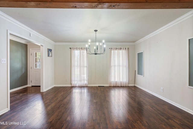 interior space featuring plenty of natural light, dark hardwood / wood-style flooring, and crown molding