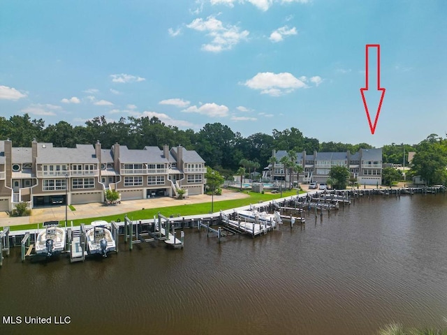 property view of water featuring a boat dock