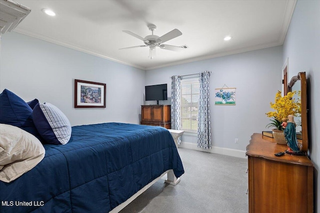 carpeted bedroom with ornamental molding and ceiling fan