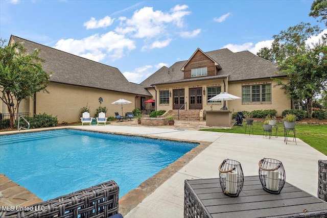 view of pool featuring a patio area