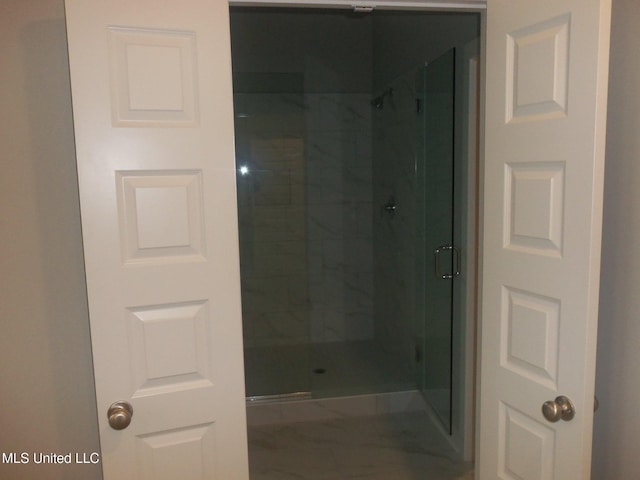 bathroom with an enclosed shower