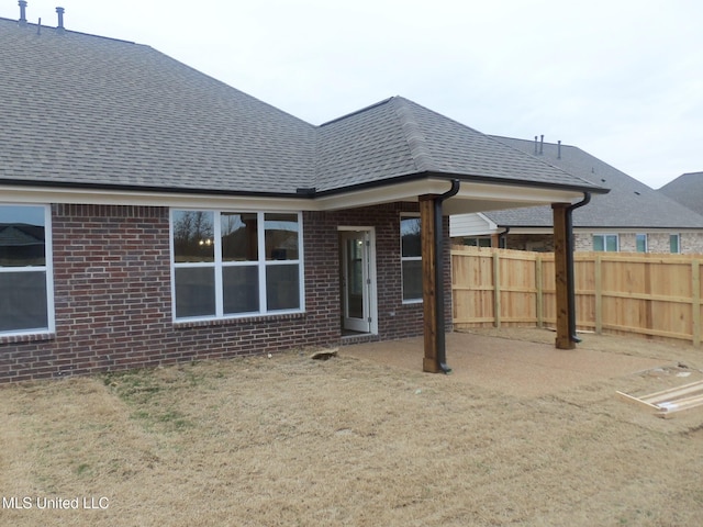 back of house with a patio area