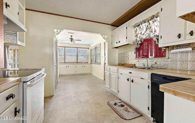 kitchen featuring black dishwasher, ceiling fan, white cabinetry, white electric range oven, and sink