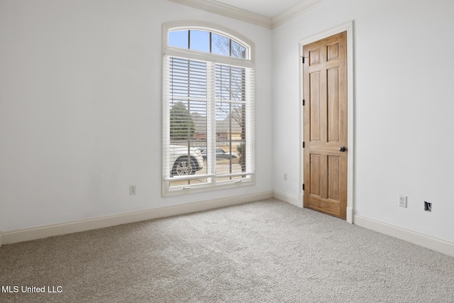 carpeted empty room with ornamental molding