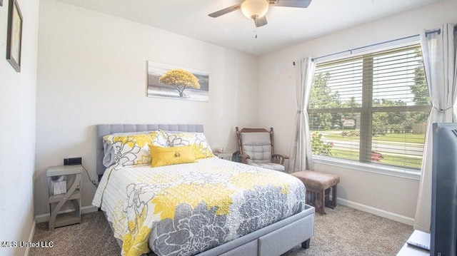 bedroom featuring carpet and ceiling fan