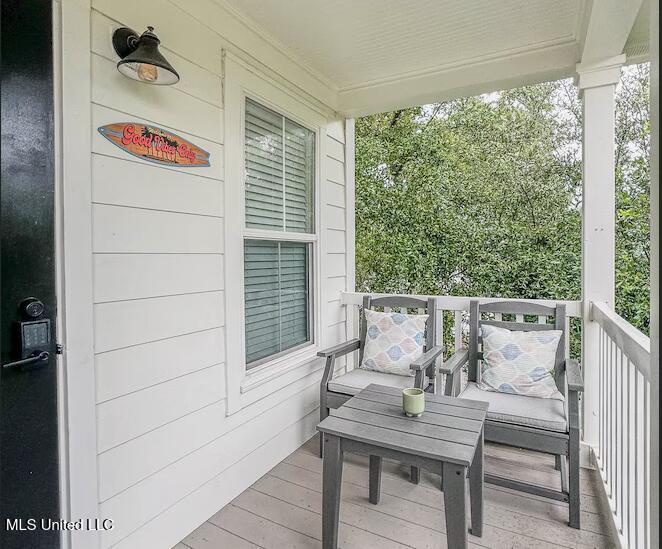 215 E Second St Unit 35, Pass Christian, MS 39571 - view of wooden porch