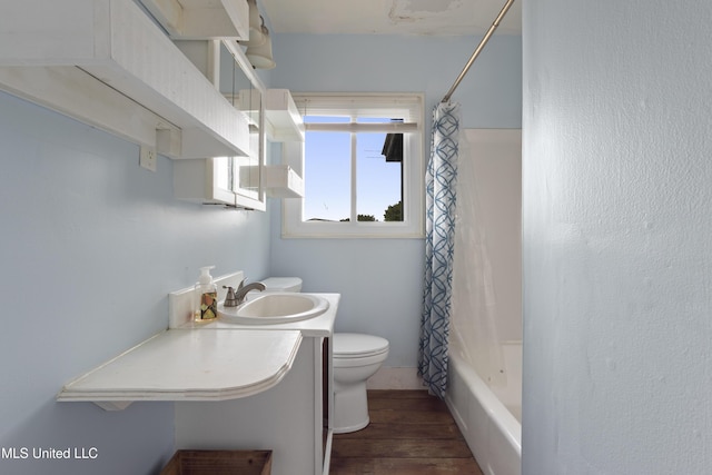 1278 Lopez Pl, Biloxi, MS 39530 - full bathroom with toilet, wood finished floors, vanity, and shower / tub combo with curtain
