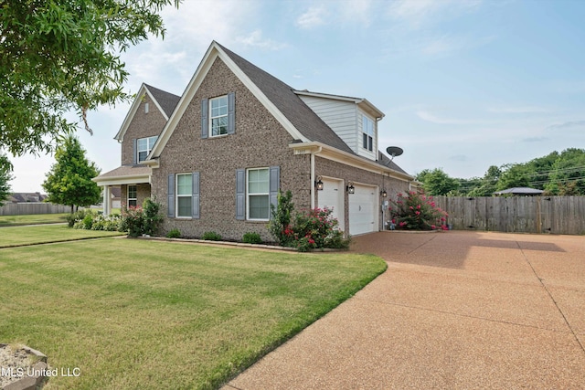 view of front of house featuring a garage and a front lawn