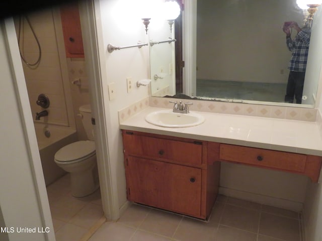 full bathroom featuring vanity, toilet, tile patterned floors, and shower / bathing tub combination