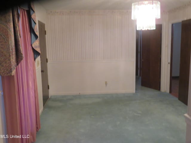 unfurnished room with carpet