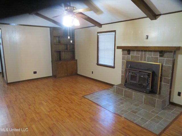 unfurnished living room featuring lofted ceiling with beams, wood-type flooring, and ceiling fan