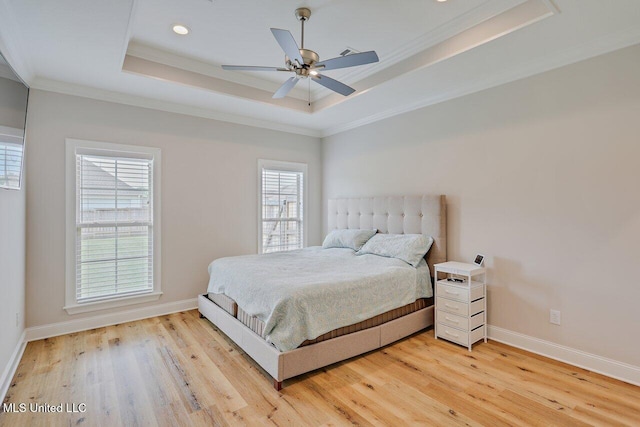 953 Glenwild Cir, Canton, MS 39046 - bedroom featuring a raised ceiling, ornamental molding, light wood-style floors, recessed lighting, and a ceiling fan