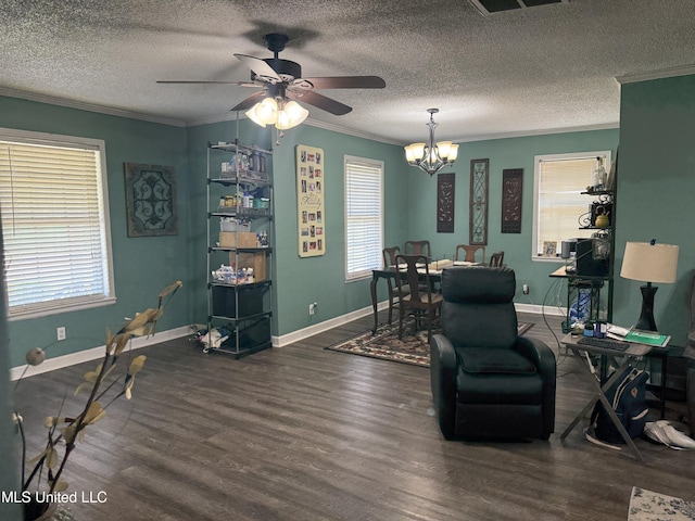 8528 E Cedar Cir, Southaven, MS 38671 - living room with a chandelier, a ceiling fan, wood finished floors, ornamental molding, and a textured ceiling