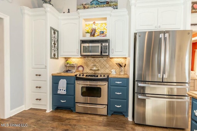 kitchen with blue cabinets, white cabinetry, stainless steel appliances, and dark wood finished floors