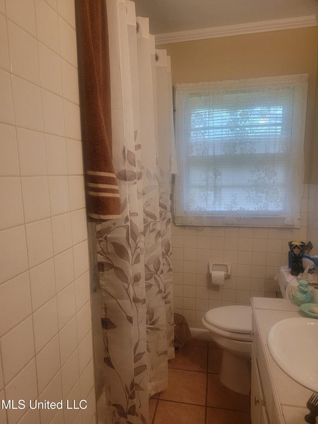 3215 Charleston Dr, Jackson, MS 39212 - bathroom with tile walls, a shower with shower curtain, tile patterned floors, vanity, and crown molding