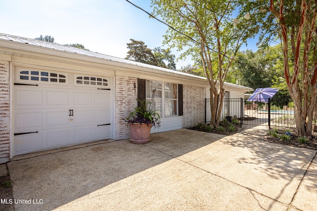 single story home featuring a garage