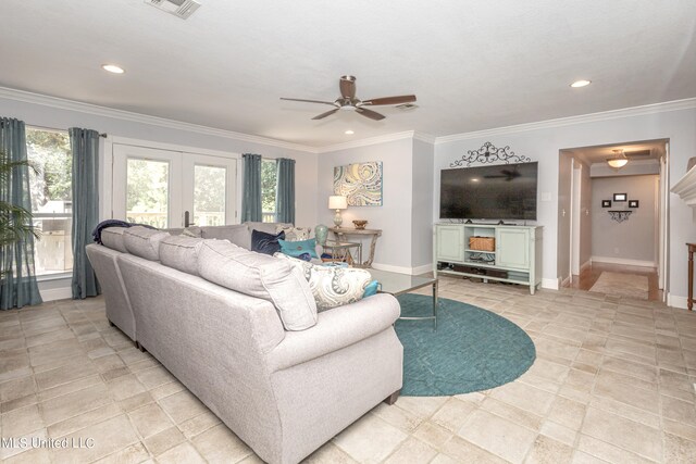 living room with crown molding, french doors, and ceiling fan