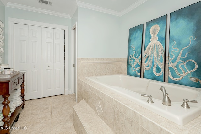 bathroom featuring vanity, tiled bath, tile patterned floors, and ornamental molding