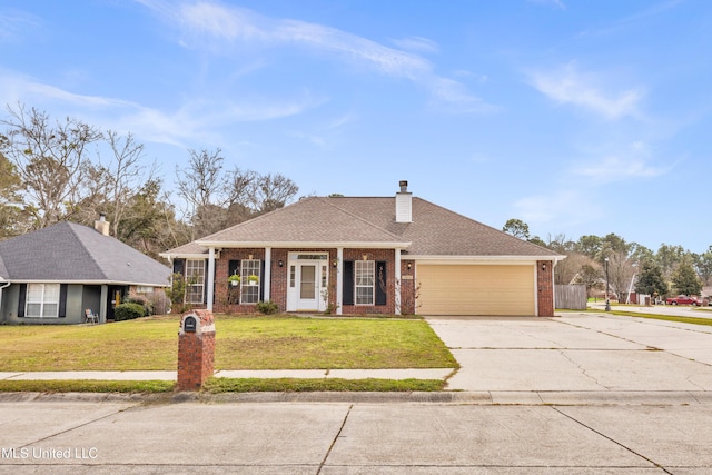 view of front facade with brick siding, a front lawn, concrete driveway, a chimney, and an attached garage