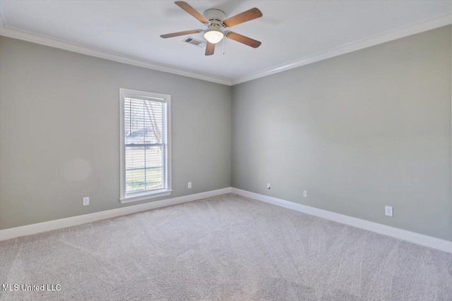 unfurnished room with light carpet, ceiling fan, and ornamental molding